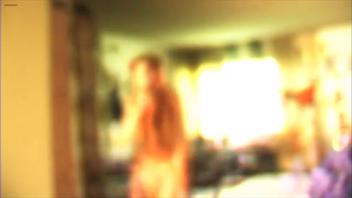 Naked Woman Exposes Her Breasts in Sexy Video